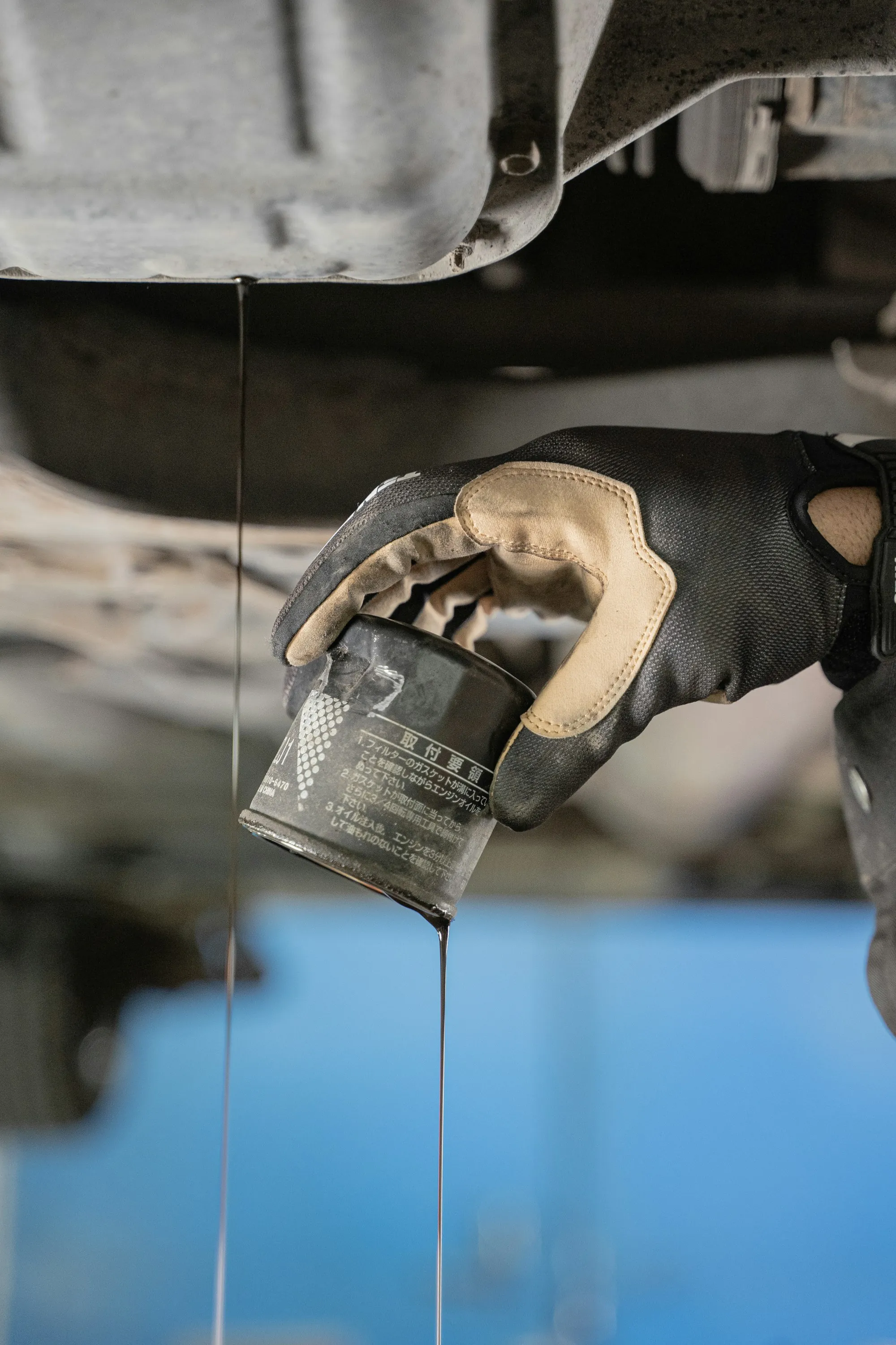 Oil filter being removed during a service